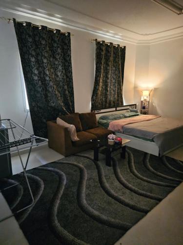 Ένα ή περισσότερα κρεβάτια σε δωμάτιο στο The New House Hostal