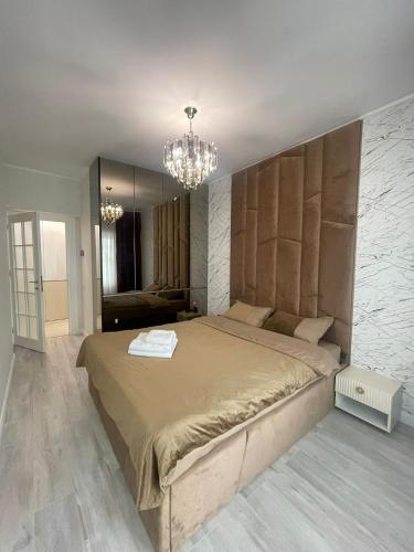 Postel nebo postele na pokoji v ubytování Capodopera Residence