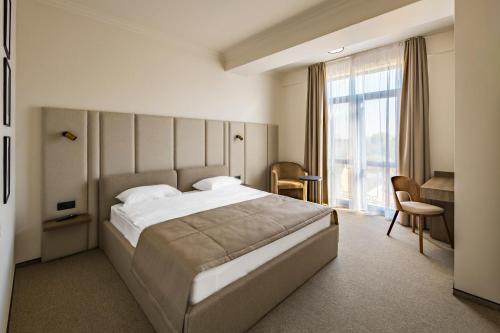 Katil atau katil-katil dalam bilik di Regency Hotel