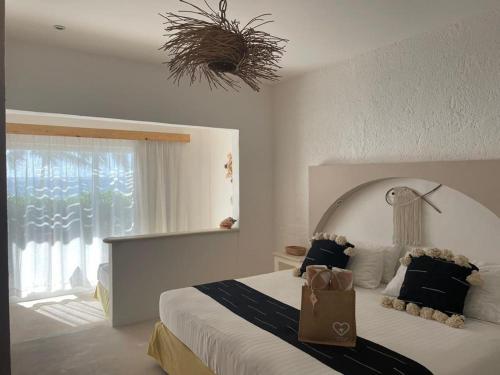 Postel nebo postele na pokoji v ubytování VR CLUB Tulum Riviera