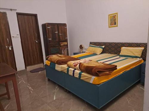 Giường trong phòng chung tại Retreat by Walias Entire Farm Pet-Friendly Sports