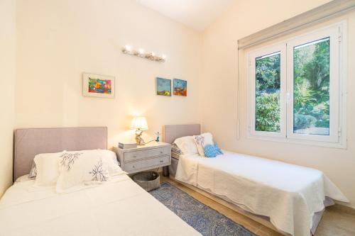 Ένα ή περισσότερα κρεβάτια σε δωμάτιο στο Villa Armonia