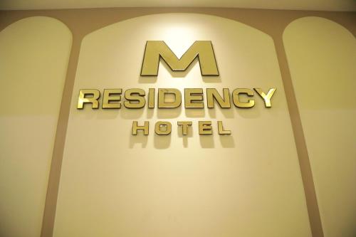 Certifikát, hodnocení, plakát nebo jiný dokument vystavený v ubytování Hotel M Residency