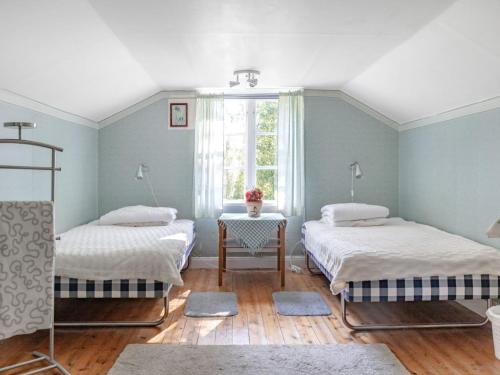 Кровать или кровати в номере Holiday Home Bolhyttan - VMD230 by Interhome