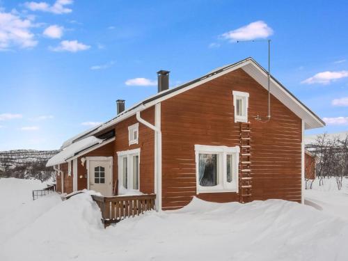 a small wooden house in the snow at Holiday Home Saana 1 by Interhome in Kilpisjärvi