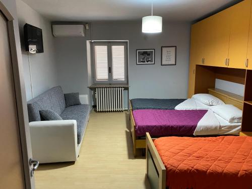 Postel nebo postele na pokoji v ubytování Silver Up appartament