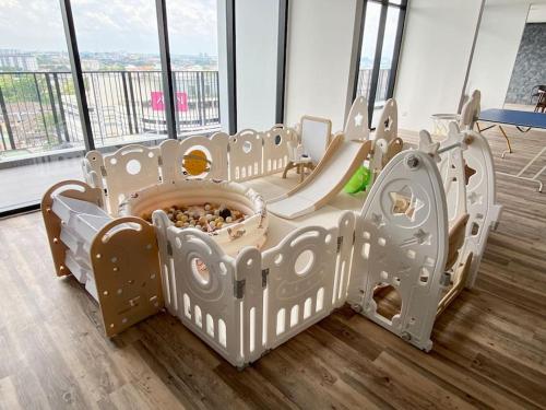 a childs bed with a slide in a room at The Podium-3R2B-Free 2 Parking-12 Pax-D321 in Kuching