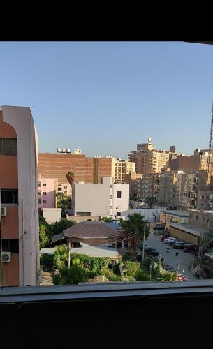 a view from a window of a city with buildings at Your place in Fayoum Center