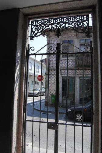 a view of a street from a window with a gate at Gaia Loves You - Serra do Pilar in Vila Nova de Gaia