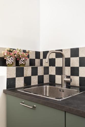 Una cocina o zona de cocina en Popolo Charming Apartment