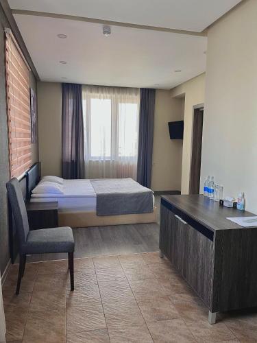 Una cama o camas en una habitación de Bien hotel