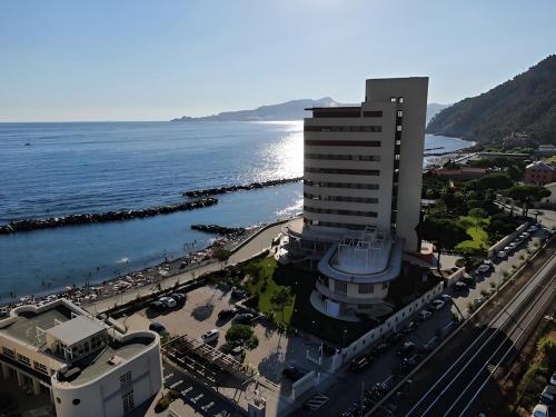 an aerial view of a building next to the ocean at Grand Hotel Torre Fara in Chiavari