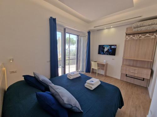 En eller flere senge i et værelse på Siren Land - Marina del Cantone