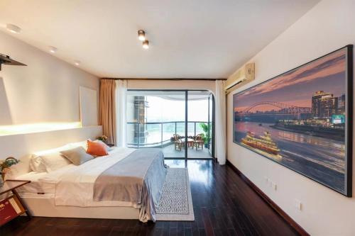 a bedroom with a bed and a large painting on the wall at Baihong Riverview Apartment-Hongya Cave in Chongqing