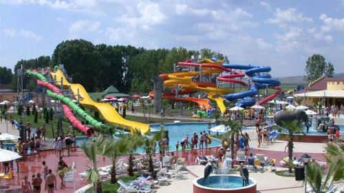 a large water park with a water slide at Апартамент FLAME in Sunny Beach