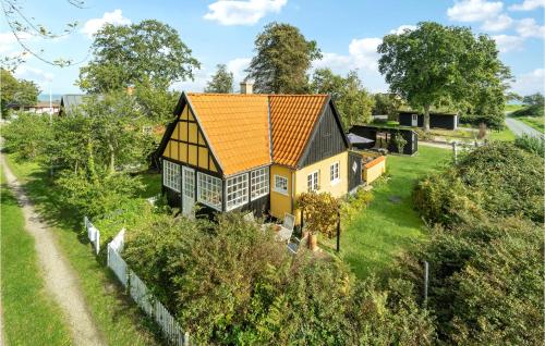 an overhead view of a house with an orange roof at 3 Bedroom Awesome Home In Tranekær in Tranekær