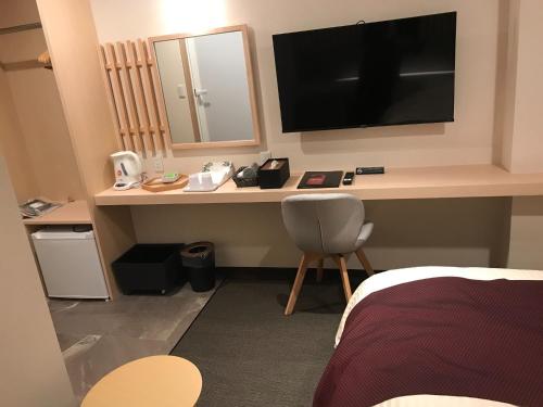 Телевизор и/или развлекательный центр в Aizu Tsuruya Hotel - Vacation STAY 57226v