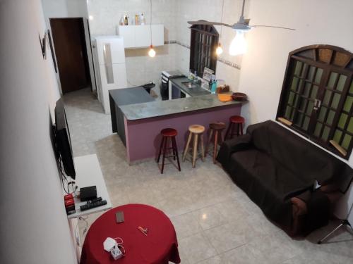 an aerial view of a kitchen and a living room at Casa ilha comprida in Ilha Comprida