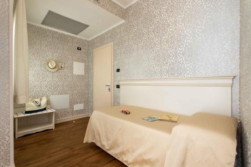 a bedroom with a bed in a room at Charming Palace Santa Fosca in Venice