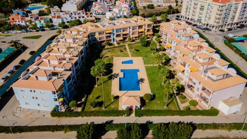 Serene Apartment W/ Balcony and Pool by LovelyStay