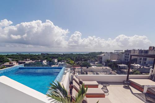 a view of a swimming pool on top of a building at Balkon Boutique Hotel in Playa del Carmen