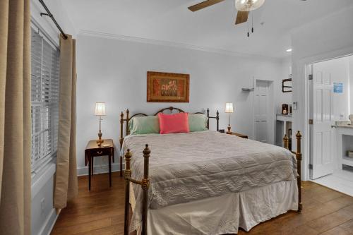a bedroom with a large bed with a red pillow at Little Inn on Main in Washington