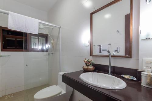 Et badeværelse på Casa Incrível em Barra do Cunhaú por Carpediem