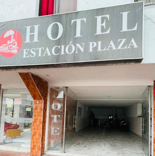 a sign for the entrance to a store at Estacion plaza in Ibagué