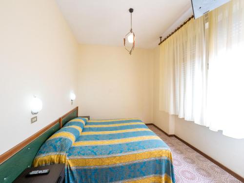 Postel nebo postele na pokoji v ubytování Hotel Blurelda