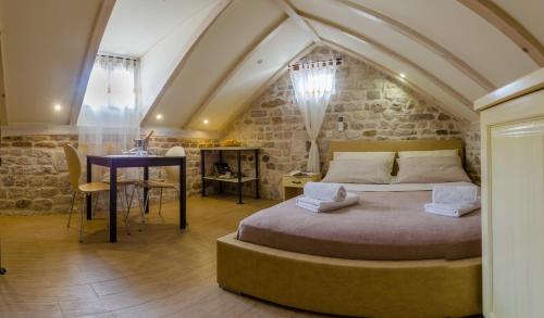 Ένα ή περισσότερα κρεβάτια σε δωμάτιο στο Apartments Kaja