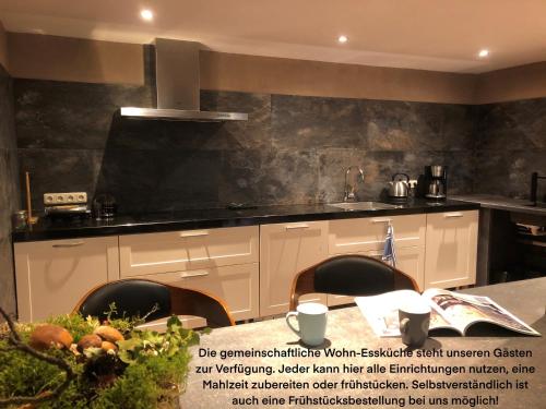 Η κουζίνα ή μικρή κουζίνα στο Familienpension Obere Juchhe, Ferienwohnung und Zimmer