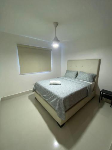 Postel nebo postele na pokoji v ubytování Hermoso apto J2