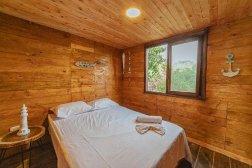 Postel nebo postele na pokoji v ubytování Hotel Prana Beach