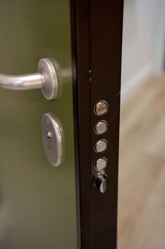 a door with a bunch of buttons on it at XANTHI POLIS CITY CENTER with private parking in Xanthi