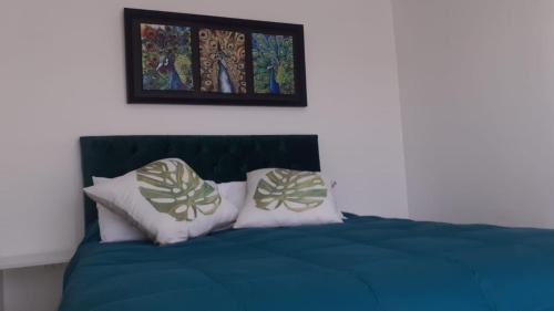 Ein Bett oder Betten in einem Zimmer der Unterkunft Ecobosque y cabañas