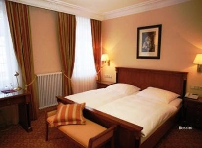 Katil atau katil-katil dalam bilik di Mokni's Palais Hotel & SPA