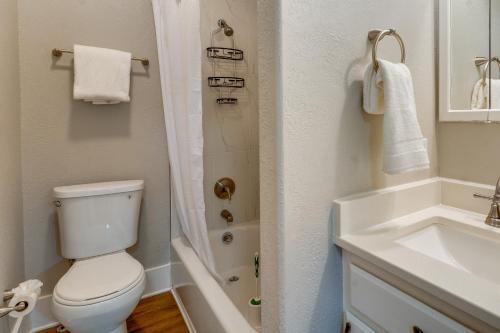 a bathroom with a toilet and a shower and a sink at Spokane Vacation Rental with Central Location! in Spokane