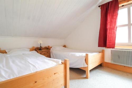 Katil atau katil-katil dalam bilik di Charming 4-bed Chalet, Mountain Views, Double Garage