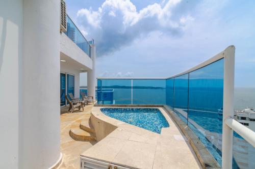 a swimming pool on the balcony of a house at Unik Cartagena Edificio Poseidon in Cartagena de Indias