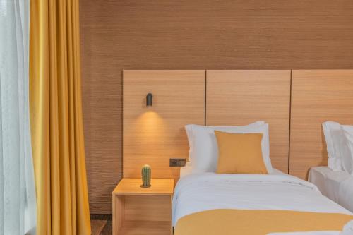 Postel nebo postele na pokoji v ubytování Hotel Osetia Garden