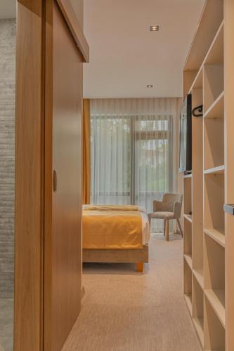 Postel nebo postele na pokoji v ubytování Hotel Osetia Garden