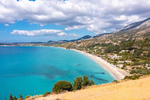 a view of a beach on a hill at Villa Thalia Sofia in Mousata