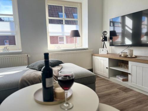 TV a/nebo společenská místnost v ubytování Haus FÜHLDICHWOHL