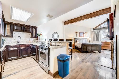 a kitchen with a sink and a stove at Silver King by All Seasons Resort Lodging in Park City
