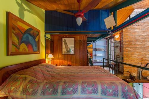 Llit o llits en una habitació de Ibirapuera Park House