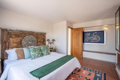 Ένα ή περισσότερα κρεβάτια σε δωμάτιο στο Angelic Centro 2BR, Pool & Jacuzzi, Gated Village