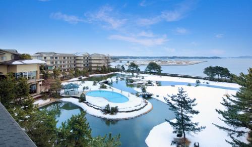 an aerial view of a resort in the snow at Matsushima Ichinobo in Matsushima