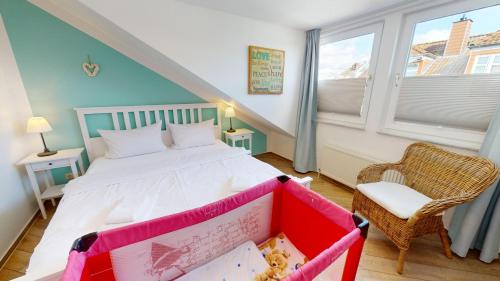 Postel nebo postele na pokoji v ubytování Grüntal-Residenz Haus I App. 7
