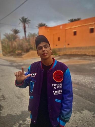 a man standing in the middle of the road at Gulmim in Sidi Ifni