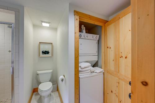 a white bathroom with a toilet and a shower at Peaceful Vacation Rental with Deck 5 Mi to Cashiers in Cashiers